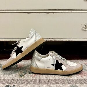 White sneakers. Vintage Havana, similar to dolce vita